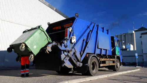 Workers handling waste removal in Richmond